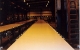 Sanitary belt conveyor on slider bed frame with noser discharge